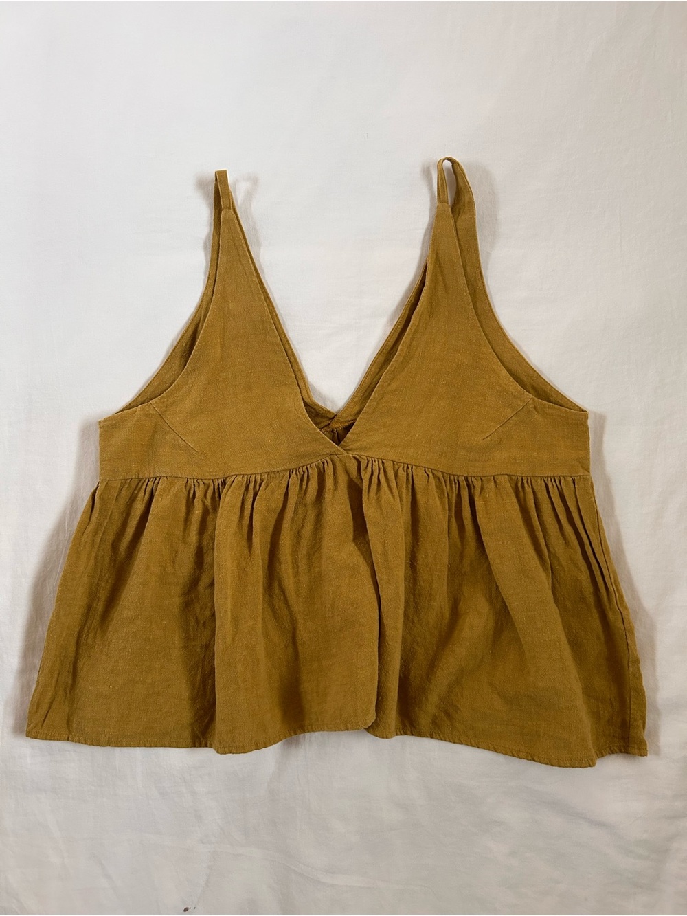 Sleeveless V-Neck Peplum Camisole in Avocado Linen